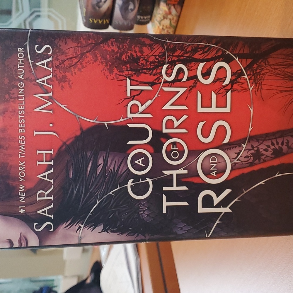 Used Hard Cover of A Court of Thorns and Roses by Sarah J Maas